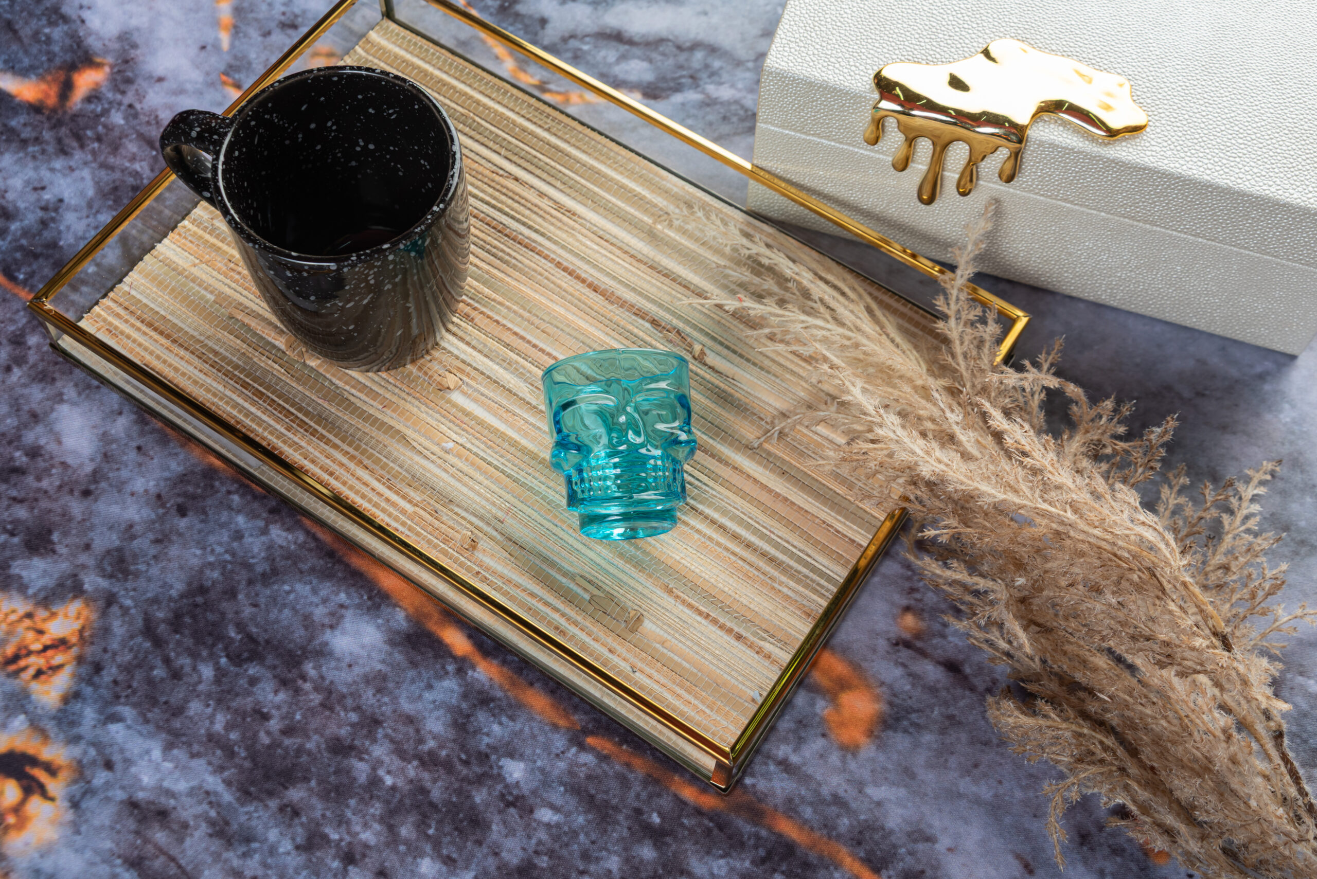 Everyday home utensils on dark marble background